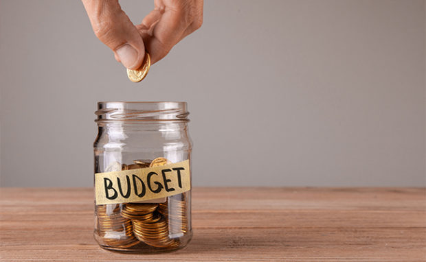 Building up savings to pay off debts.