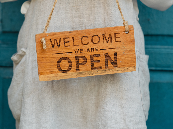 This is an "open" sign of a business.