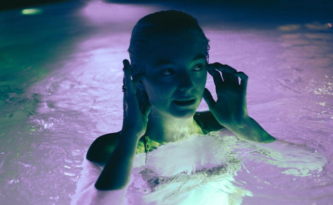 In her first Instagram post in over two years, a bikini-clad Lorde shares a cryptic update