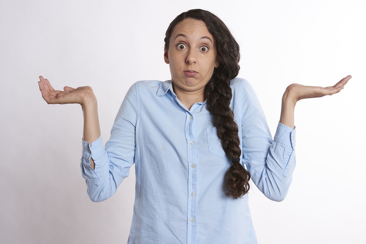 Woman shrugging in confusion used in CrossCountry Mortgage article section discussing whether the lender is the right choice for homebuyers